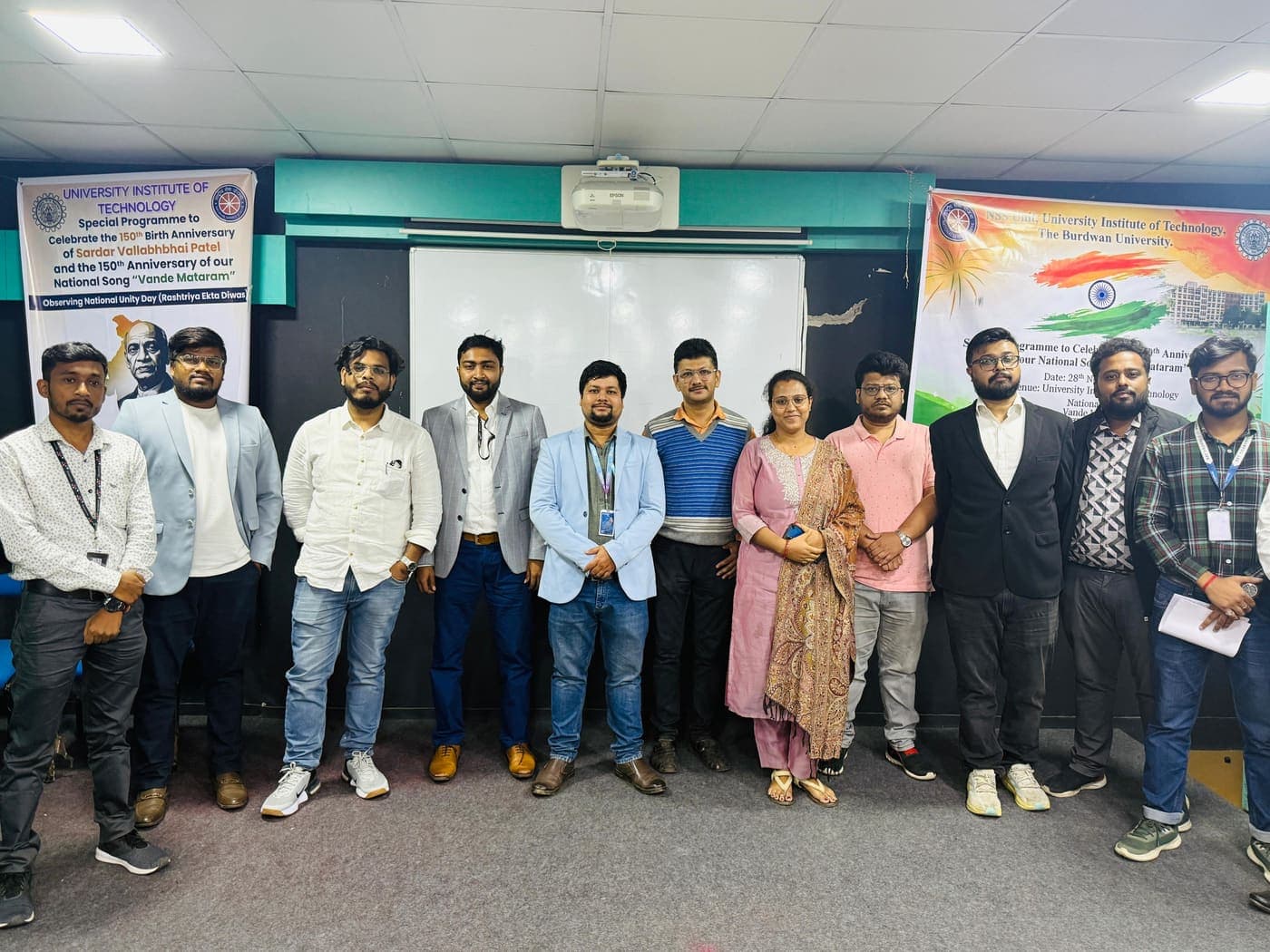 Techimpace team photographed with faculty in front of University Institute of Technology, Burdwan banners